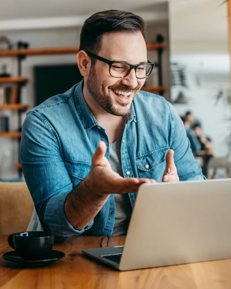 Man with beard and glasses on a Telehealth call